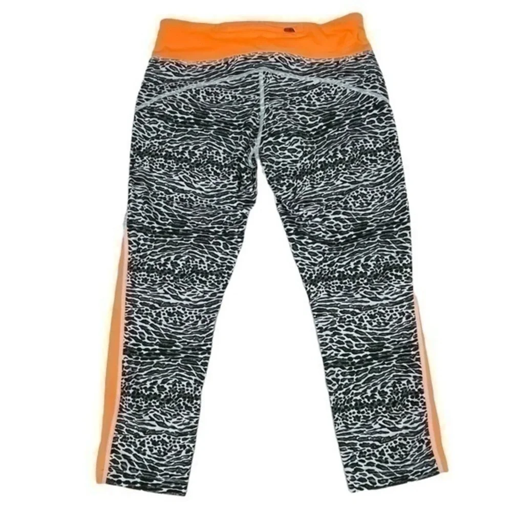 Nike Dri-Fit Women Cropped Leggings Medium | Black White Orange